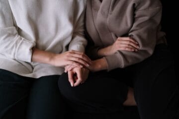 Comforting hands offering support and sympathy