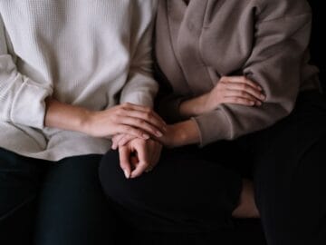 Comforting hands offering support and sympathy